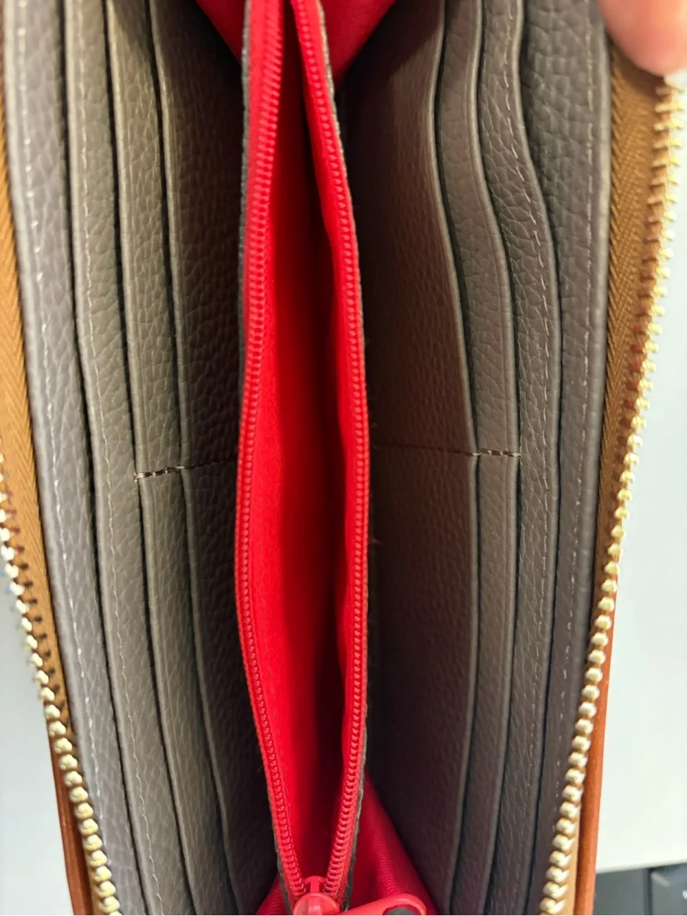 Dooney & Bourke Pebble Grain Zip Clutch